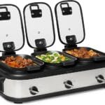 Amazon Basics - Olla de cocción lenta triple con revestimiento antiadherente de cerámica, controles de temperatura individuales, asas de bloqueo, tapas de vidrio, 3 x 2.5 cuartos de galón, acero inoxidable